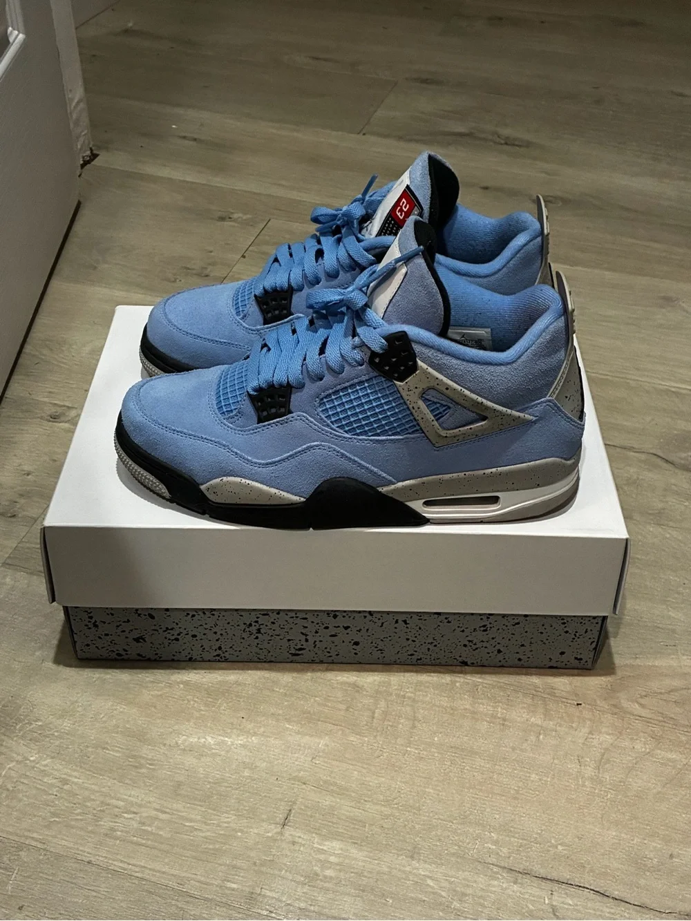 Air Jordan 4 UNC Men’s Athletic Shoes - Light Blue and Black
